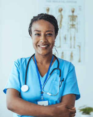 Smiling nurse folding her arms and looking at the camera